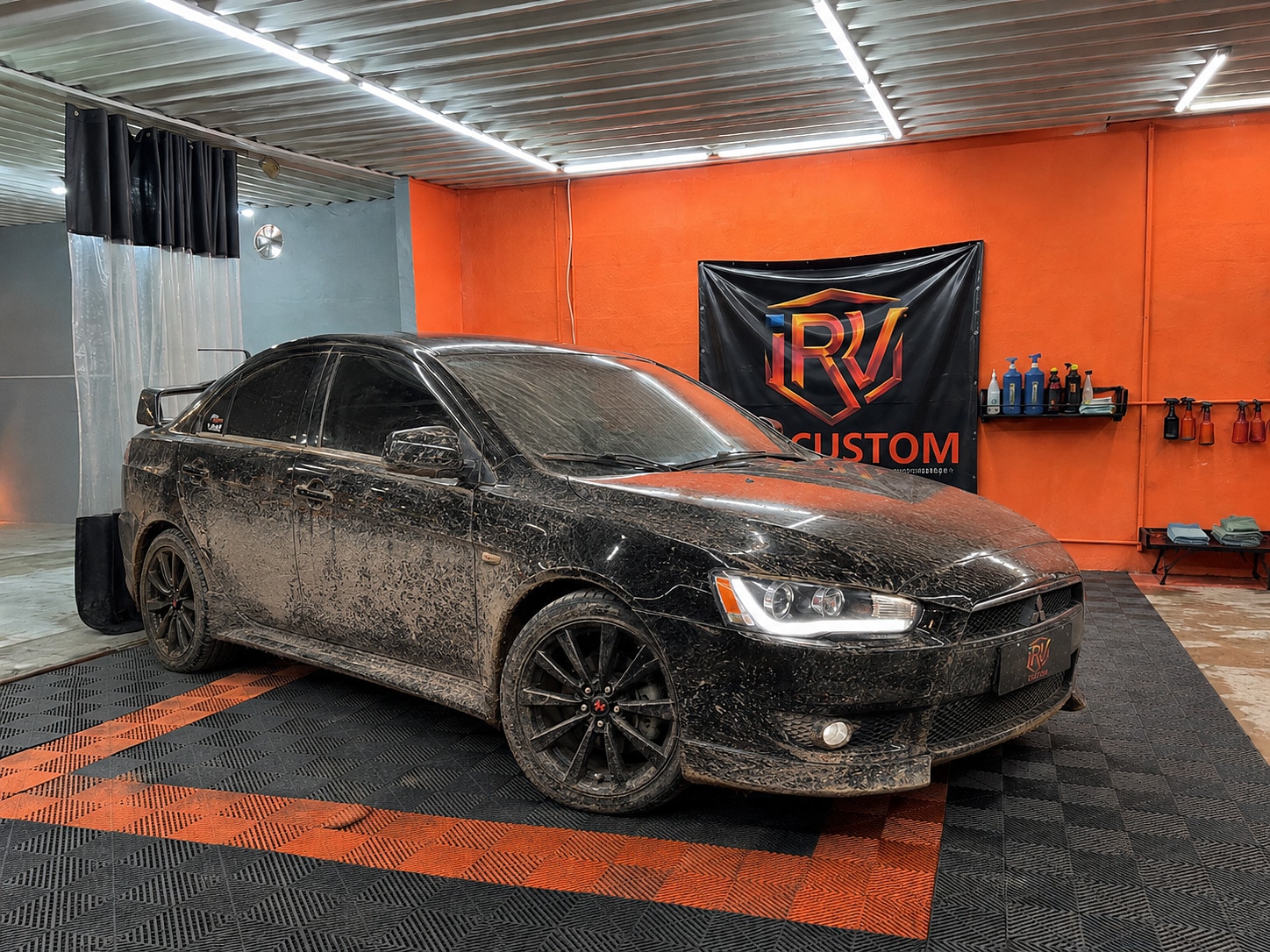 Lancer preto sujo, antes da lavagem detalhada